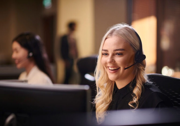 Echo employee happily connecting with customers.