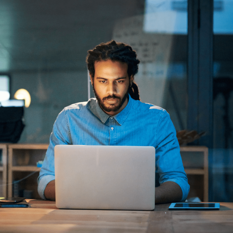 Echo employee working at laptop.