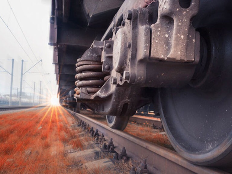 A close-up of an intermodal train wheels.