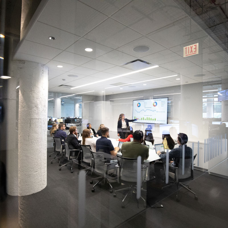 Echo employees engaging in a team meeting to discuss Managed Transporation initiatives.