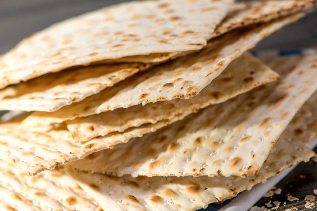 Photo of stacked Matzah bread.