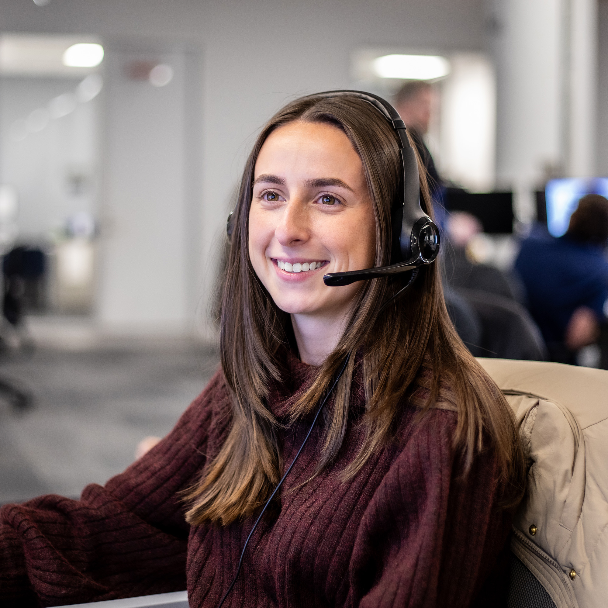 An Echo employee sitting at their work station helping clients ship freight.