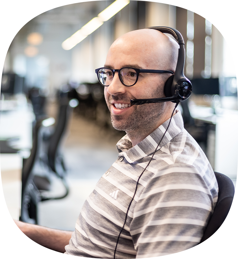 An Echo team member at their work station helping a client optimize their retail supply chain.