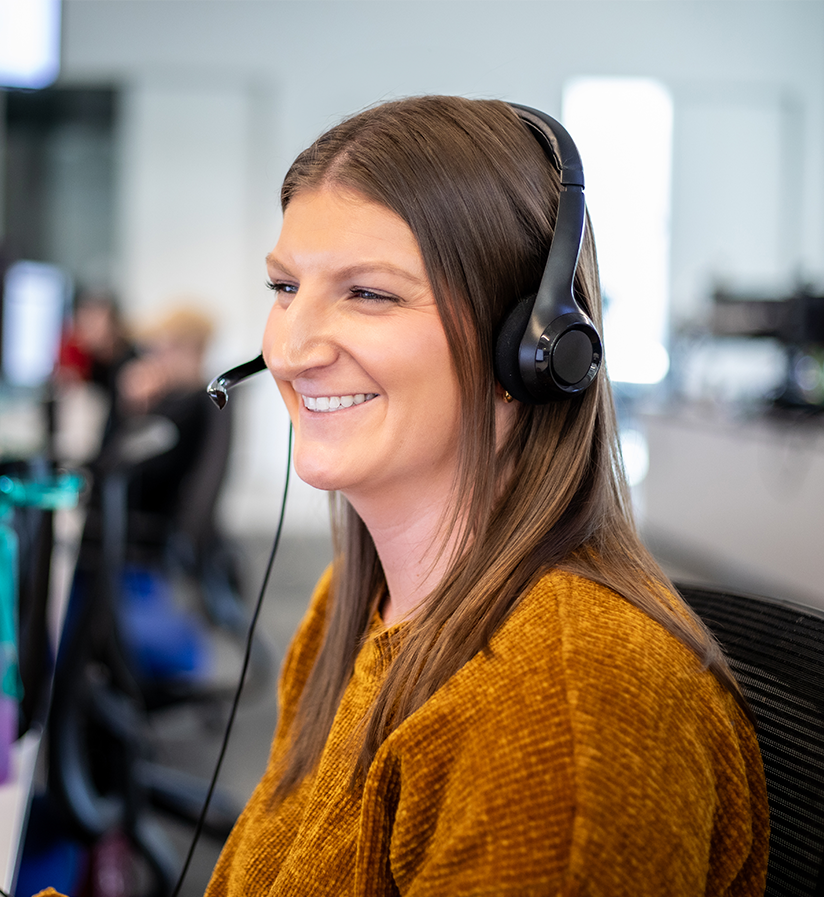 An Echo team member at their work station helping a client optimize their supply chain.