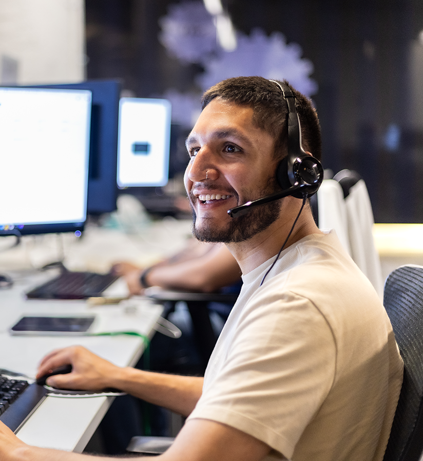 An Echo team member at their work station helping a client optimize their supply chain.