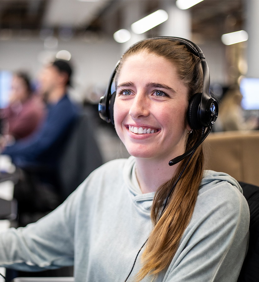 An Echo team member at their work station helping a client optimize their supply chain.