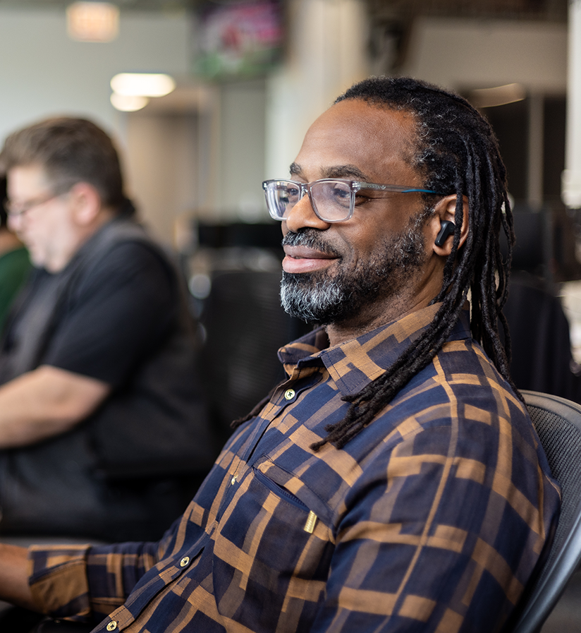 An Echo team member at their work station helping a client optimize their supply chain.