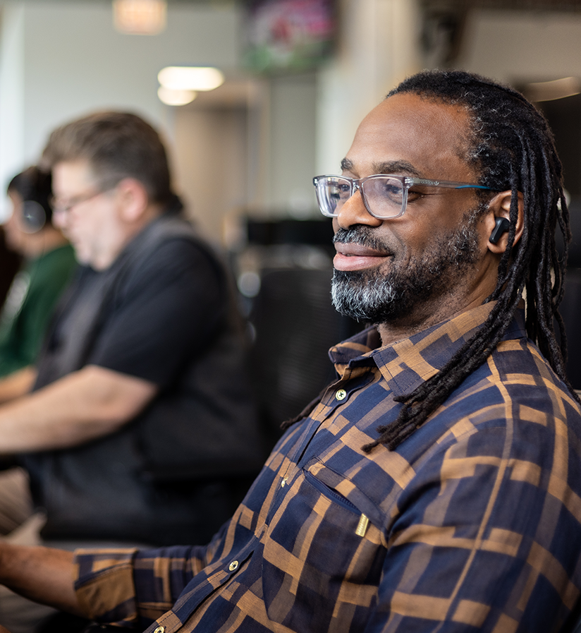An Echo representative sitting at work station answering client calls.