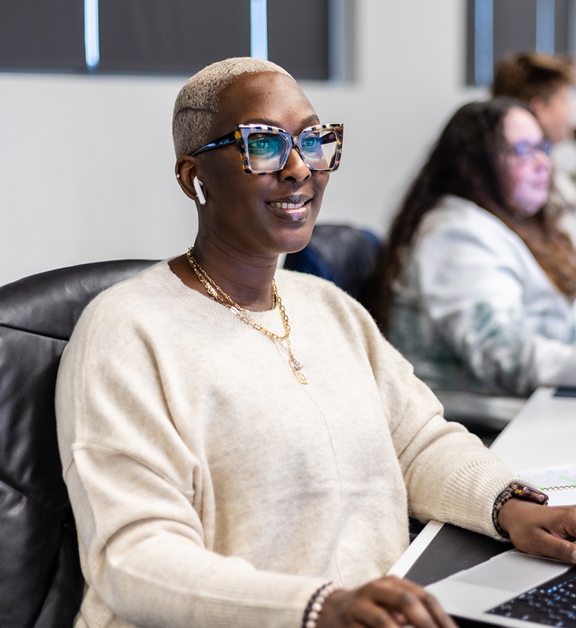 An Echo team member at their work station helping a client optimize their supply chain.
